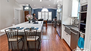 Transitional Gray Kitchen view of island with two chairs
