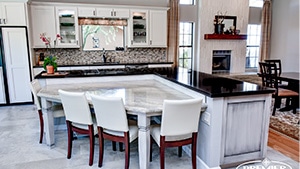 Open-Concept Elegant White Style kitchen island with table