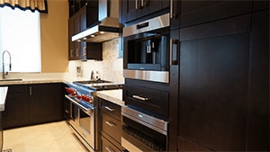 Rich Brown Shaker Cupboard doors and Built-In Double Ovens