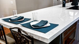 Table Set For Two On Transitional Gray Kitchen Island