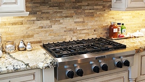 French Style Kitchen Cooktop and Hood Focus