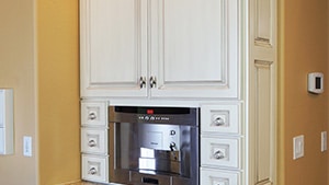 Built-In Oven in White French-Style Mitered Cupboard