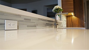 Elegant Stainless Steel Faucet View From White Quartz Countertops